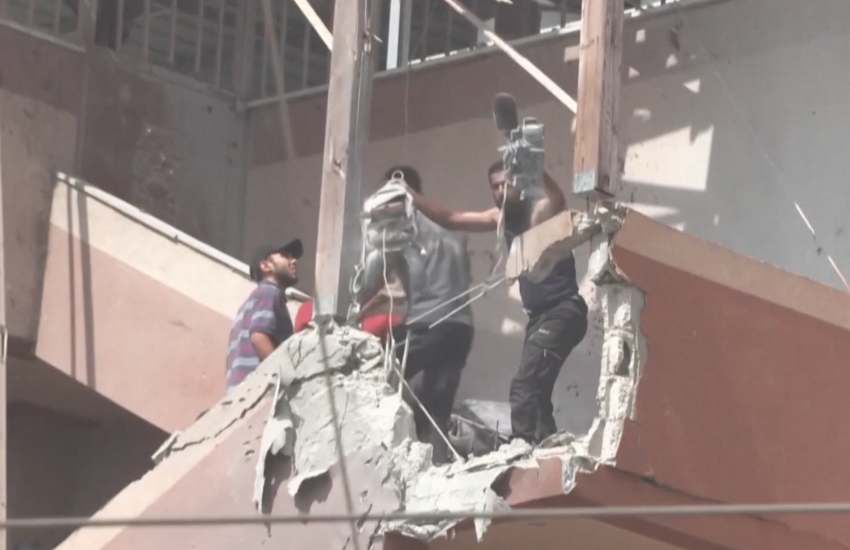 Journalists are seen at Nasser Hospital in Gaza, after an Israeli missile hit and moments before a second Israeli projectile landed killing them in this scene from The New York Times' visual investigation of the attack.